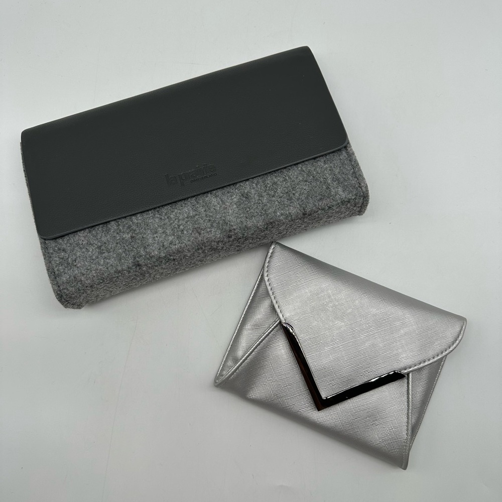 La Prairie Gray Makeup Bag and Silver Pouch